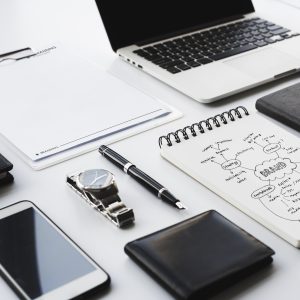 Closeup of black and white stationery on white table