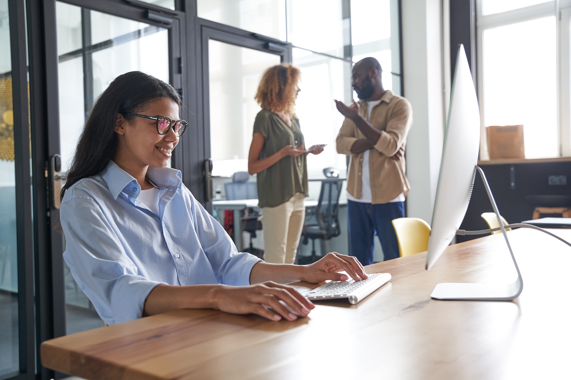 Employee speaking with customer via social network