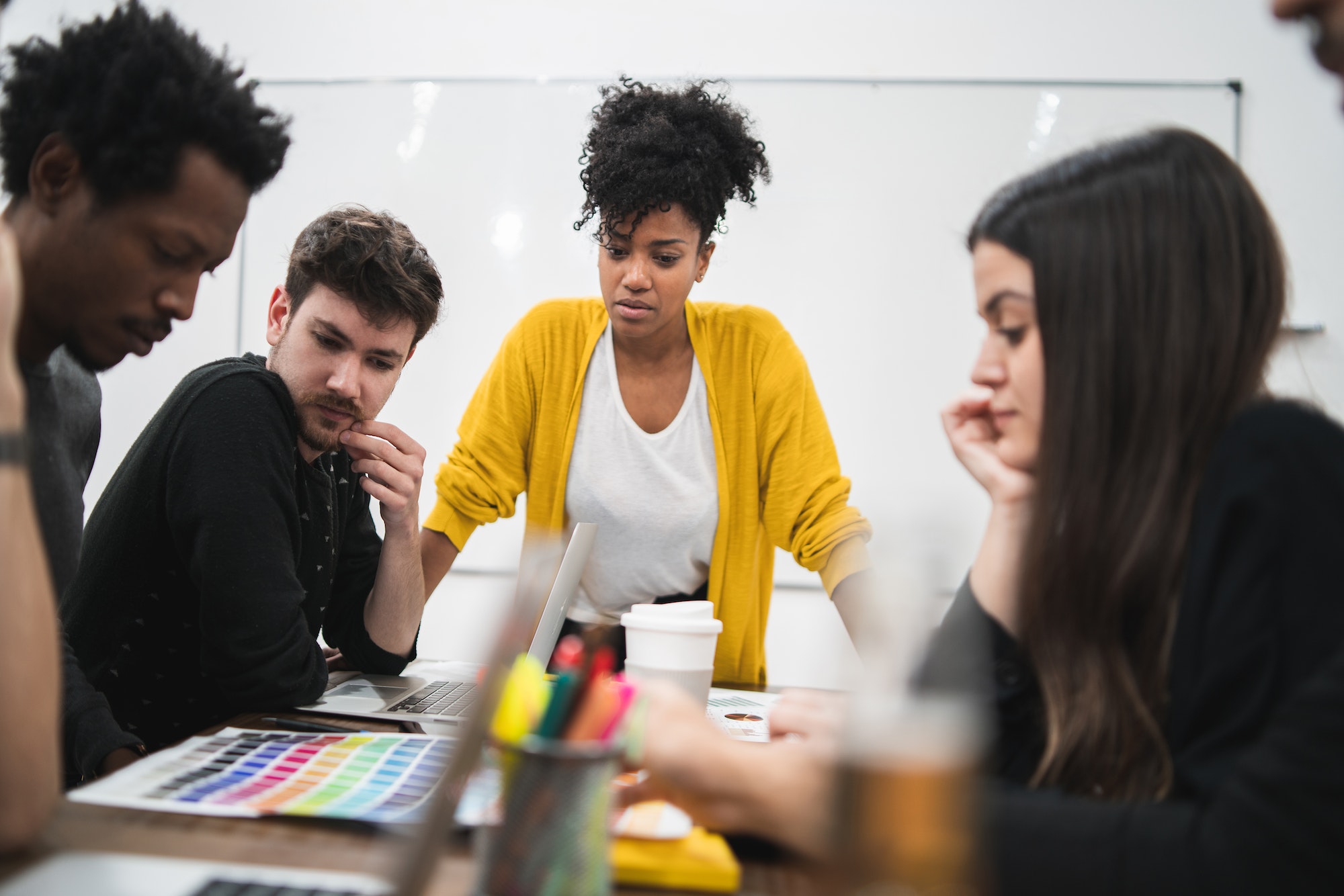 Manager woman leading a brainstorming meeting.